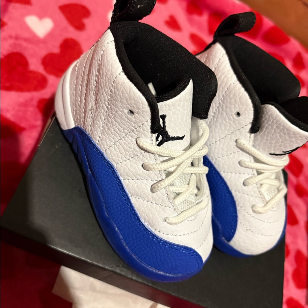 Jordan 12 Retro TD in White, Black, and Royal Blue